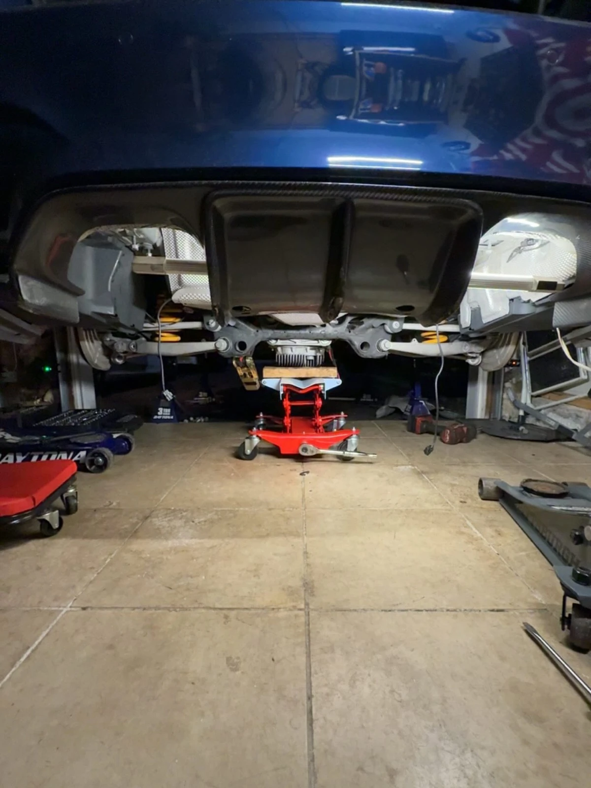 Car on the lift at the Toro Performance garage